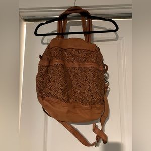 Brown leather flower design bag